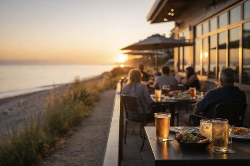 outdoor dining professional sunset ocean view relaxation friends