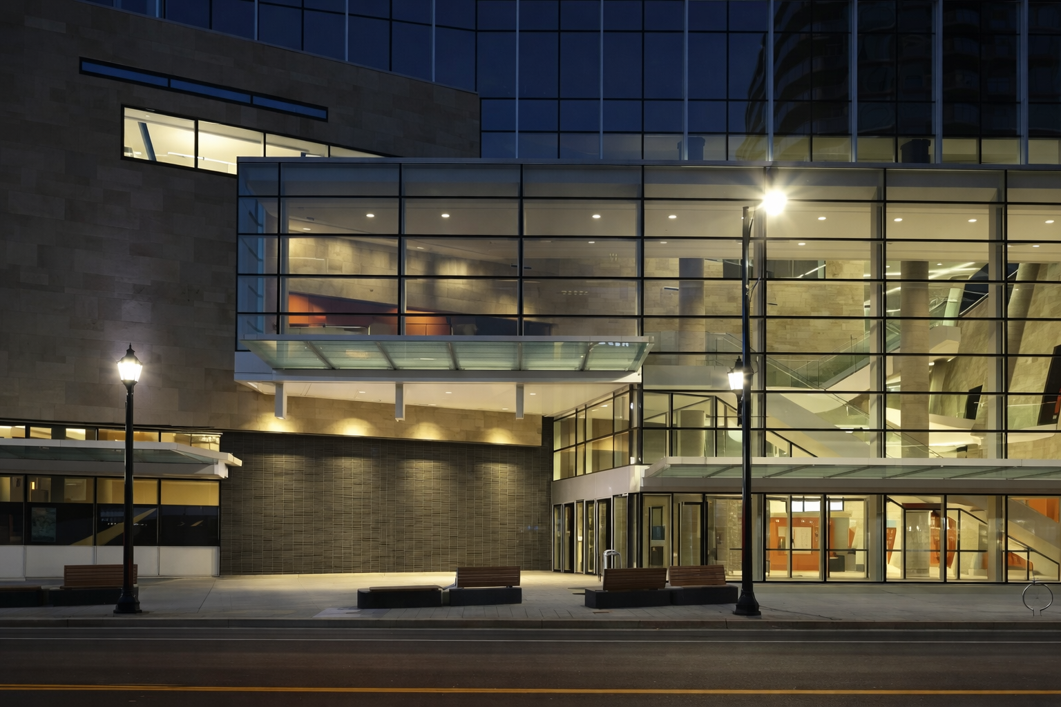 modern-glass-building-at-night-directory