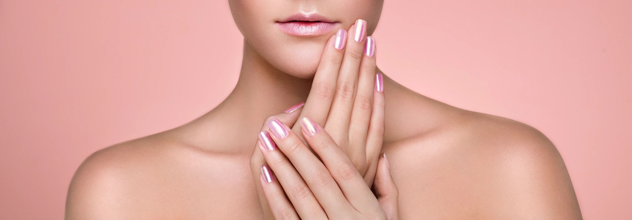 Beauty Woman with perfect Makeup and Manicure. Glamour Girl. Pink Lips and Nails. Skin care foundation. Beauty girls Face