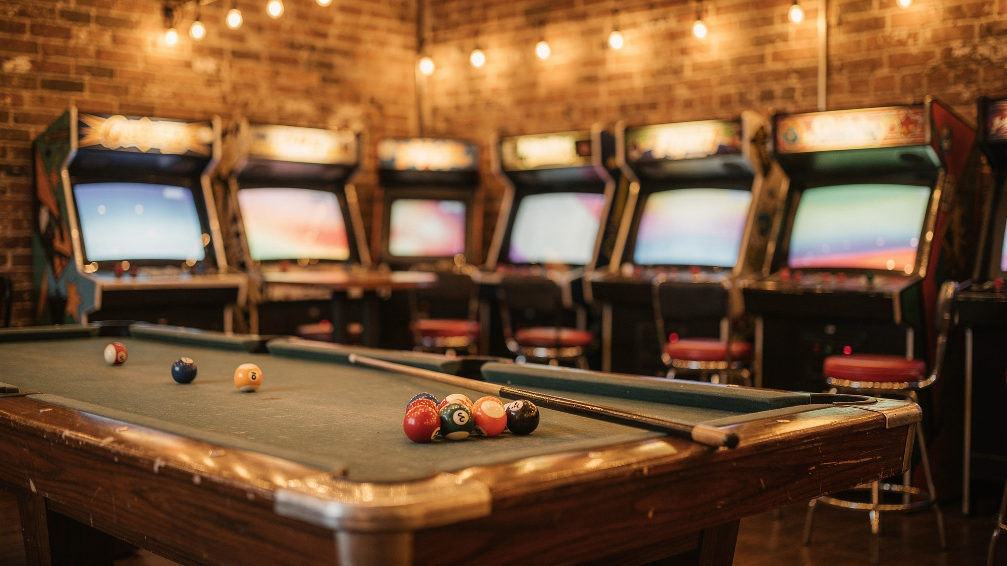 retro-arcade-room-with-classic-arcade-cabinets-red-stools-and-pool-table-at-capital-city-arcade-new-westminster-indoor-activity-spot-v2